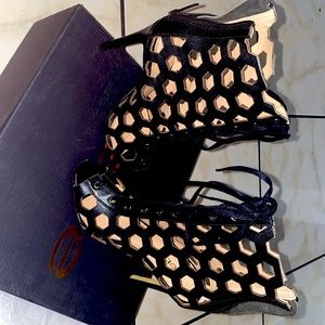 Bebe caged heels in Black